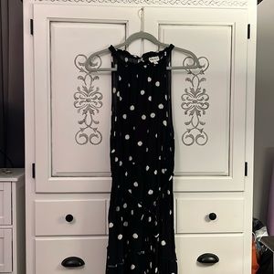 Halter-style black dress with white polka dots